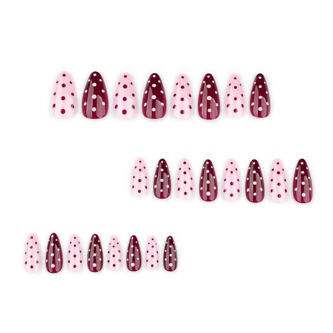 Artful Nail Extensions with Dots and Elegant Accents Bowlift