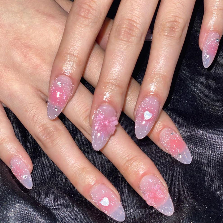 Artistic stiletto nails with floral design and glitter Bowlift