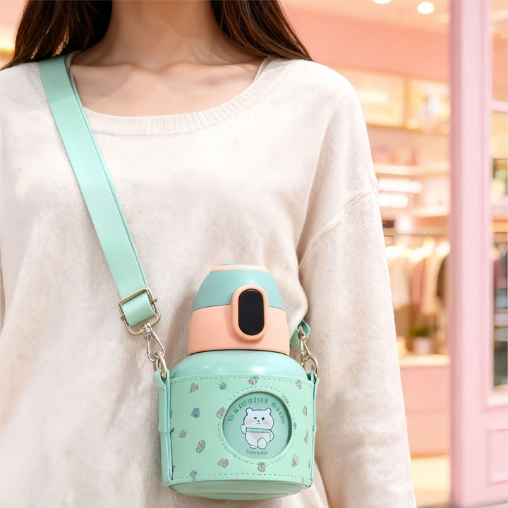 Insulated water bottle with practical carrying strap and cute design Bowlift