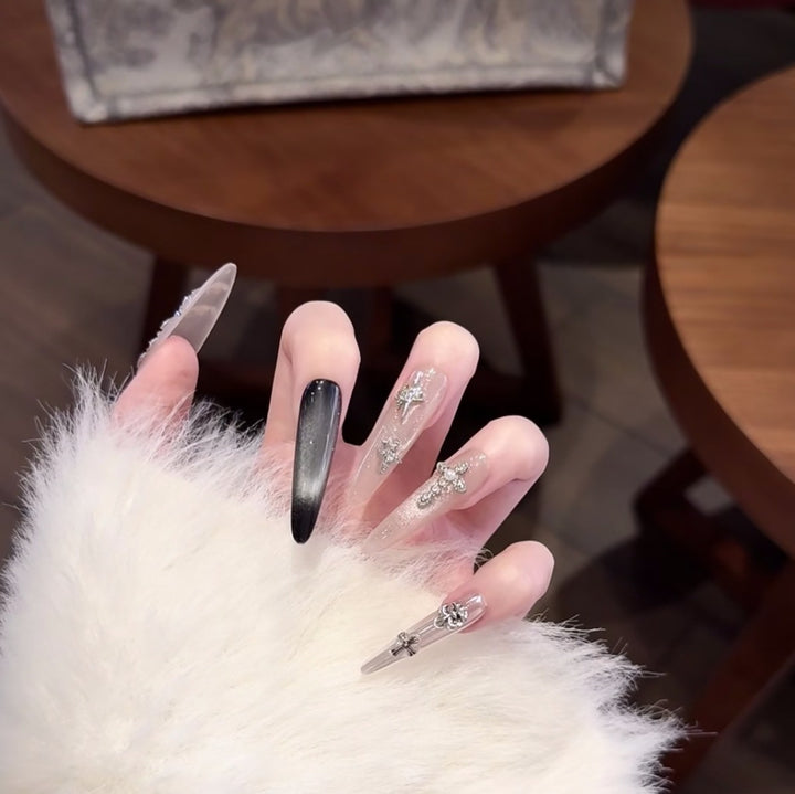 Artistic Long Stiletto Nail Extensions with Crystal Accents
