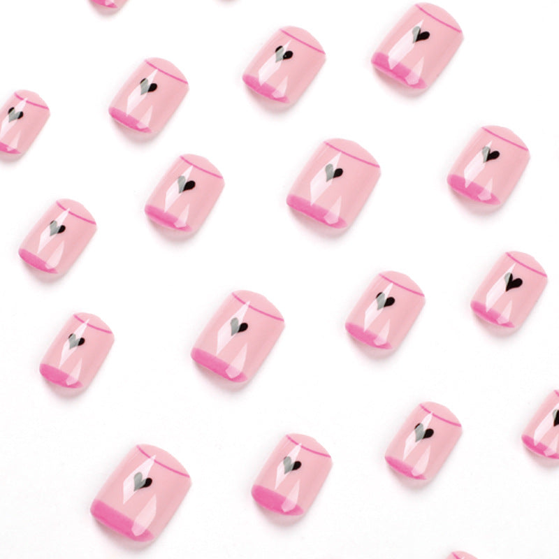 Creative Nail Art with Heart Design and Glitter Accents Bowlift