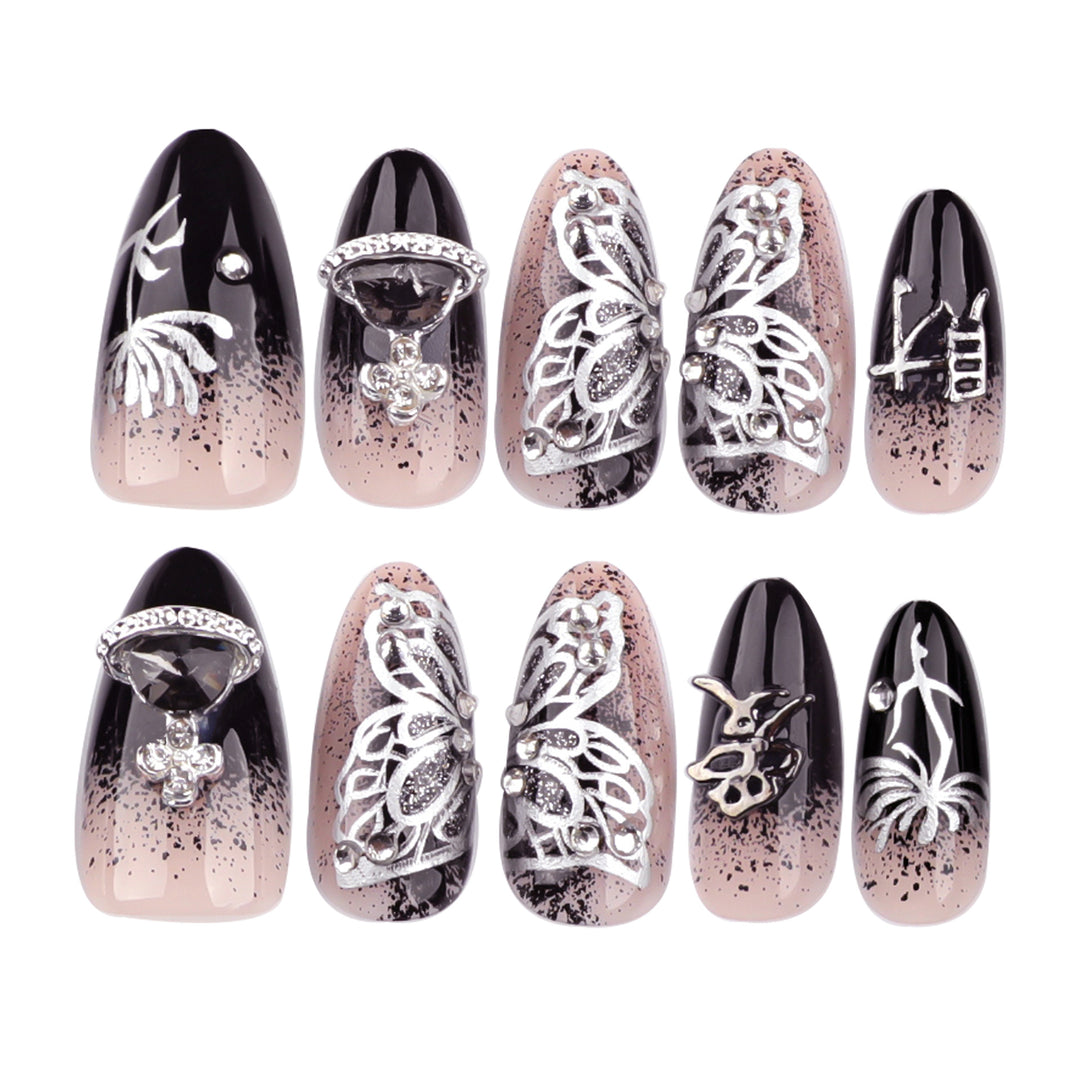 Artful stiletto nails with delicate embellishments and glamour accents Bowlift