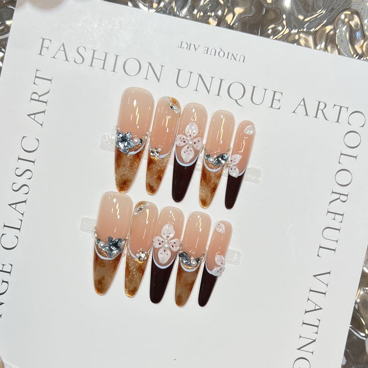 Elegant Stiletto Press-On Nail Set with Decorative Accents Bowlift
