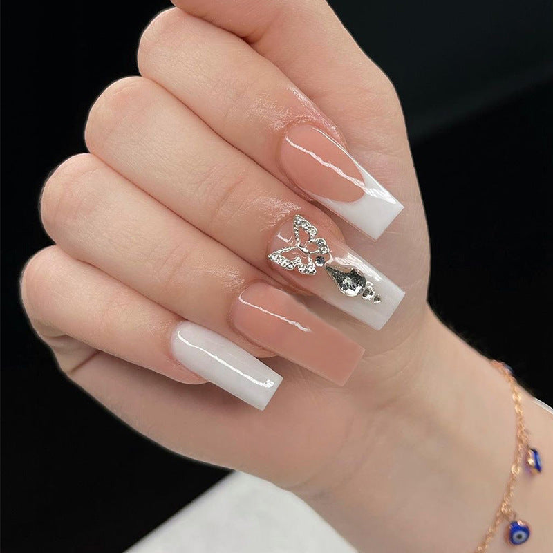 Elegant artificial nails with butterfly accents Bowlift