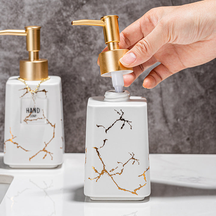 Luxury marble-effect ceramic soap dispenser with gold pump Bowlift