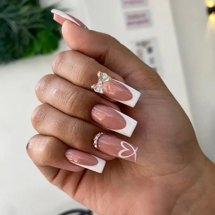 Acrylic nail set with elegant butterfly accents and rhinestones Bowlift