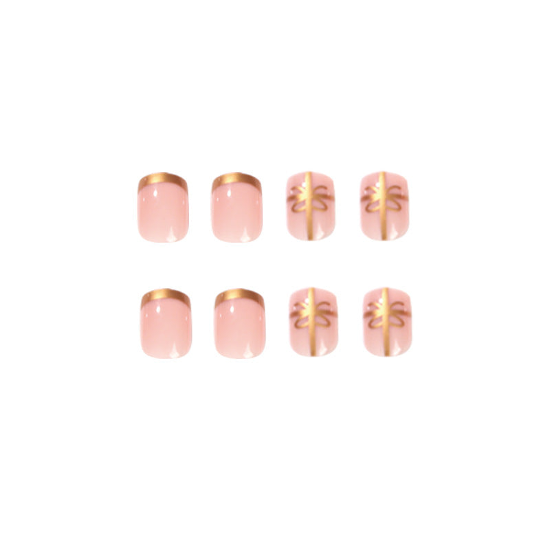 Elegant nail design with gold accents Bowlift