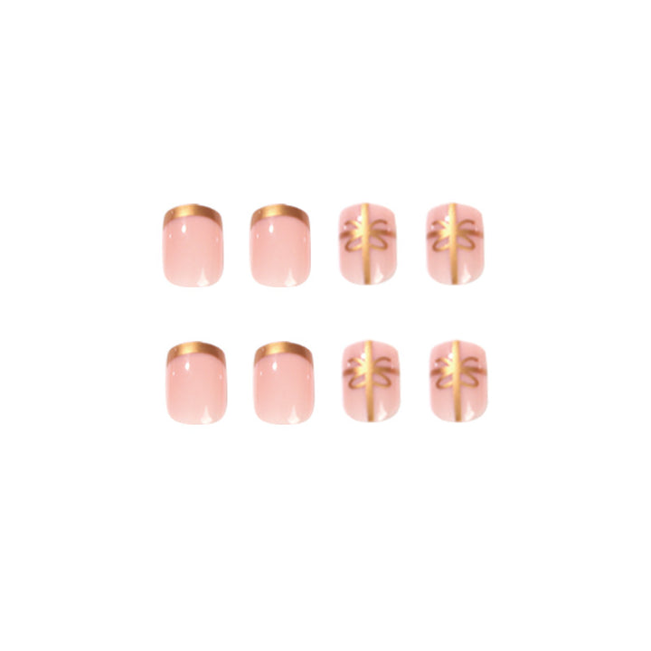 Elegant nail design with gold accents Bowlift