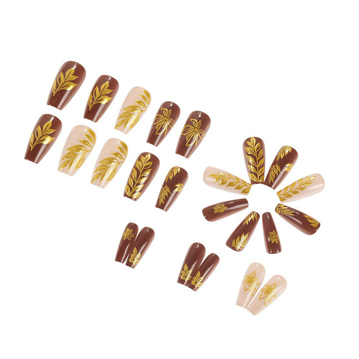 Artificial nails with floral gold design Bowlift