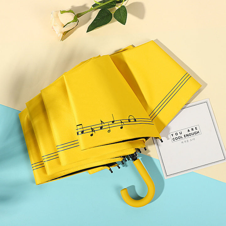 Ladies compact folding umbrella with elegant design and ergonomic wooden handle Bowlift