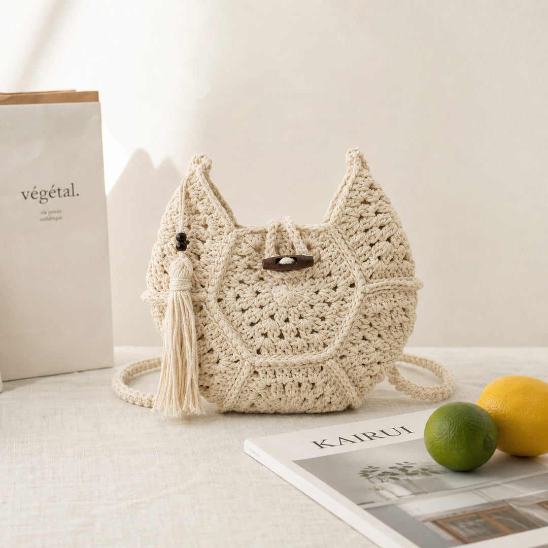 Hand-knotted shoulder bag with tassels Bowlift