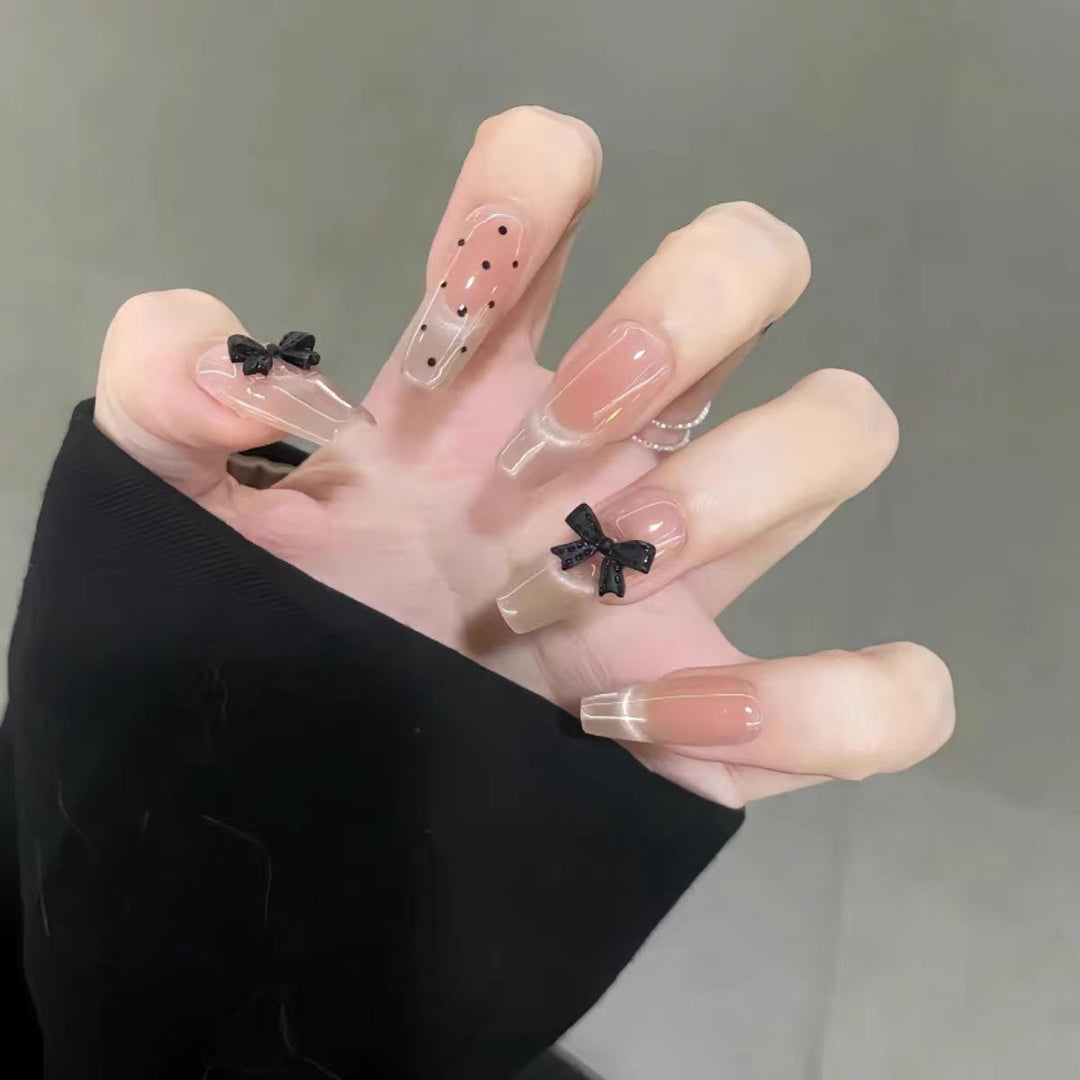 Artistic Long Stiletto Press-On Nails with Bow Accents Bowlift