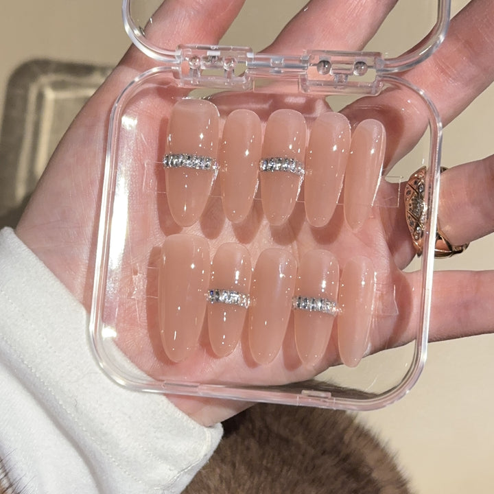 Glamorous artificial nails with rhinestones Bowlift