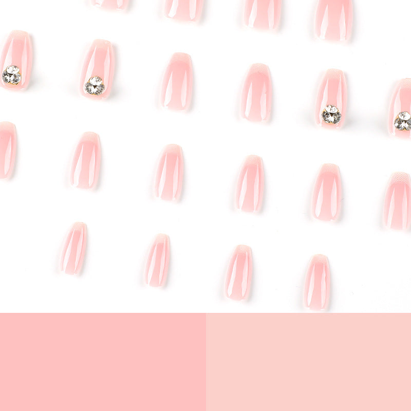Artful nail extensions with elegant French tip and rhinestone embellishments Bowlift