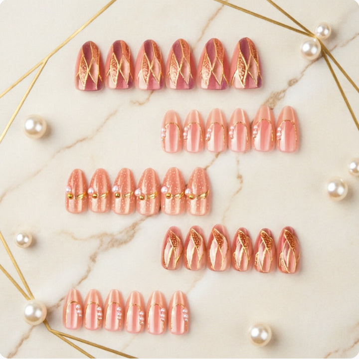 Artificial nails with elegant pearl and gold accents Bowlift