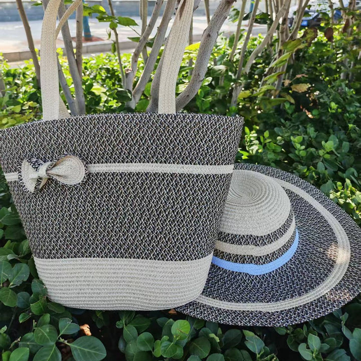 Elegant sun hat with wide brim and subtle stripe pattern Bowlift