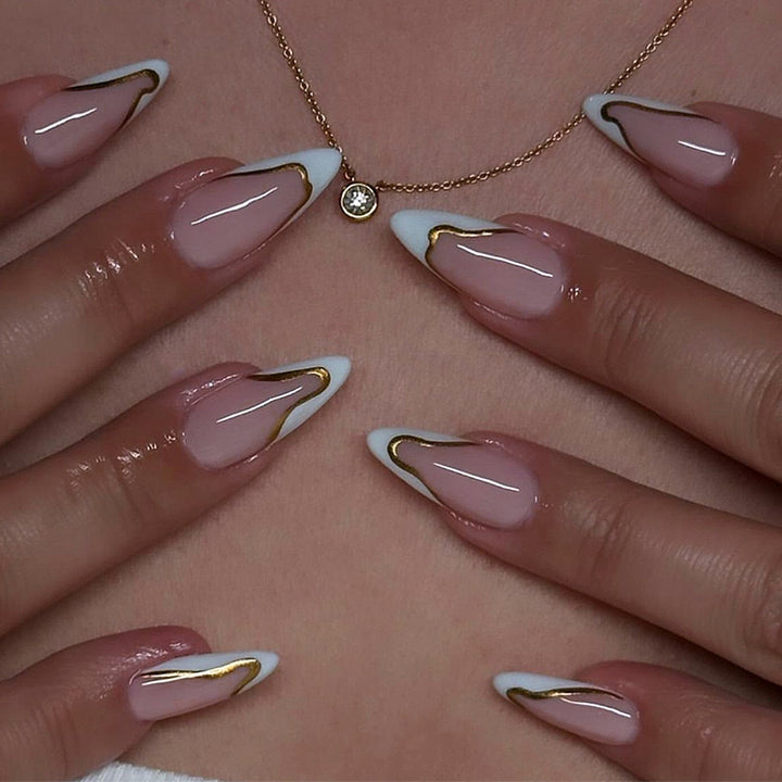 Artificial nail set with elegant French design and gold accents Bowlift