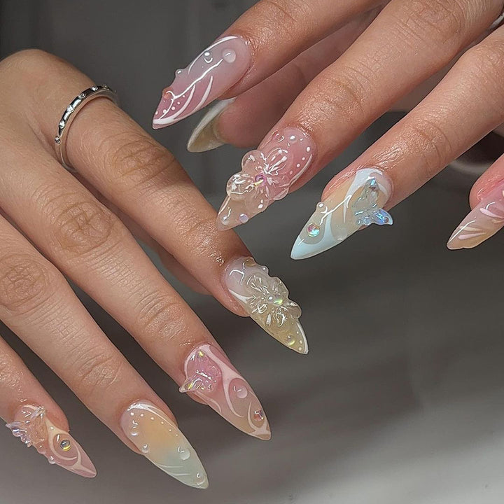 Artful Nail Extensions with 3D Flowers and Glitter Accents Bowlift