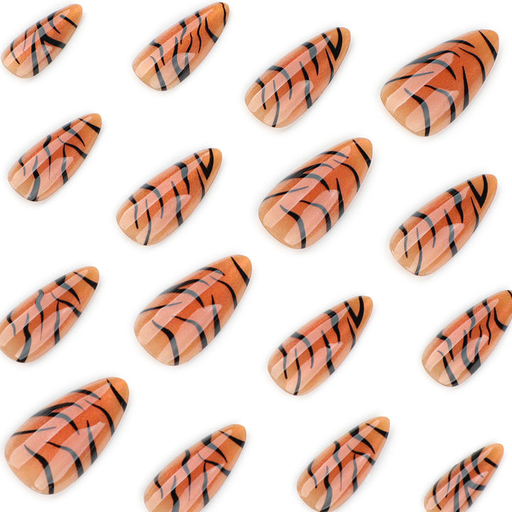 Artful stiletto nails with creative tiger stripe design Bowlift