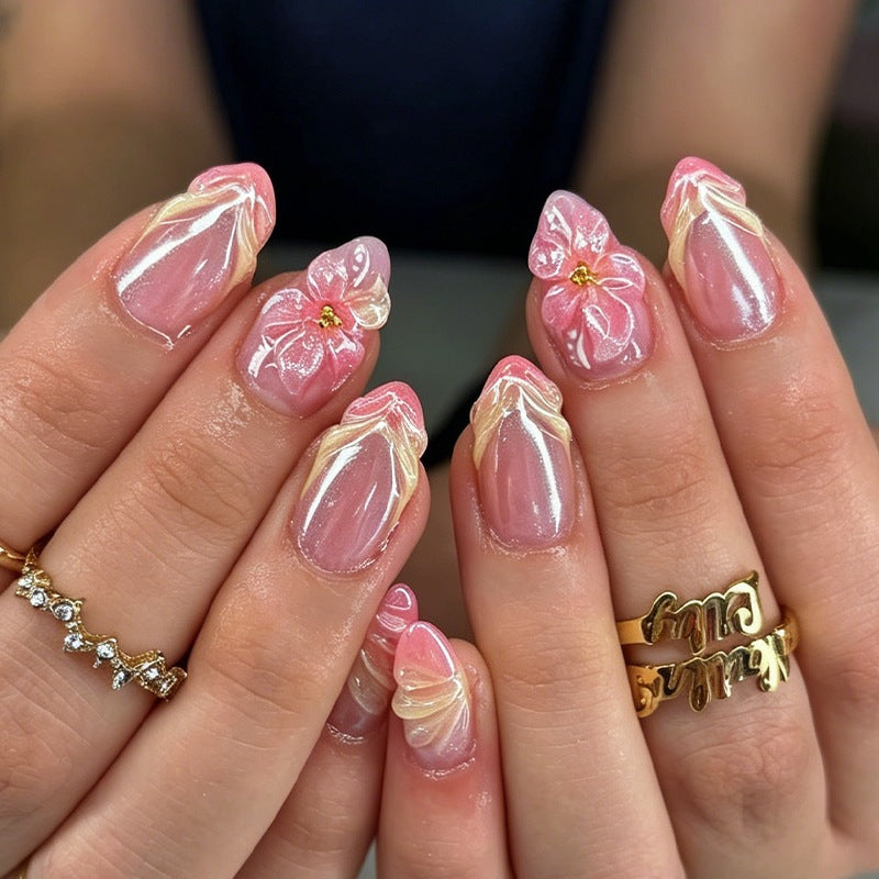 Artificial nail set with filigree flowers and glitter accents Bowlift