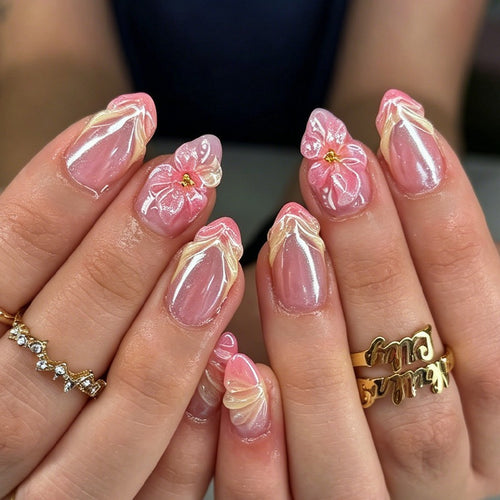 Artificial nail set with filigree flowers and glitter accents Bowlift