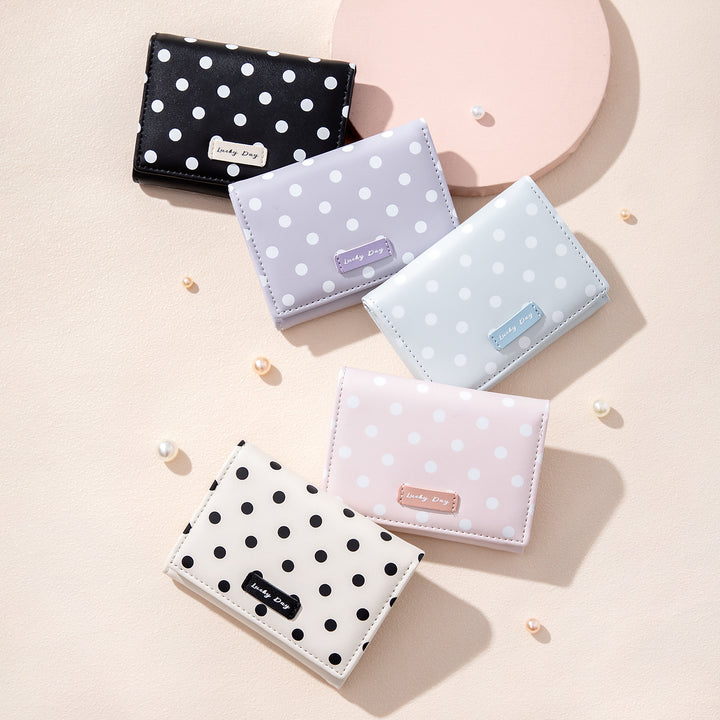 Compact polka dot trifold wallet with RFID protection multiple card and coin compartments Bowlift