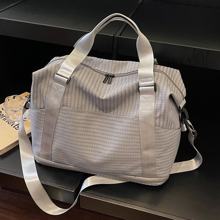 Sporty travel bag with practical storage and adjustable shoulder straps Bowlift