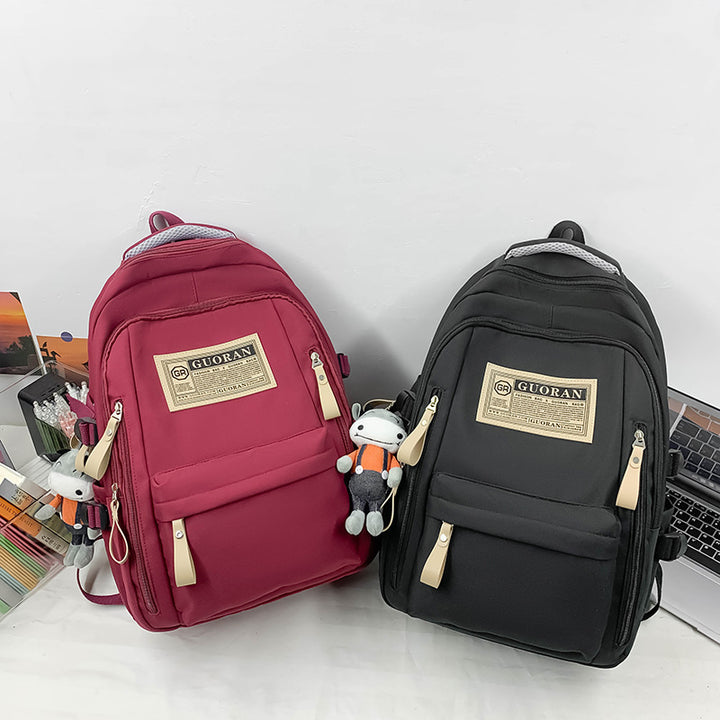Versatile Casual Backpack with Plush Keychain