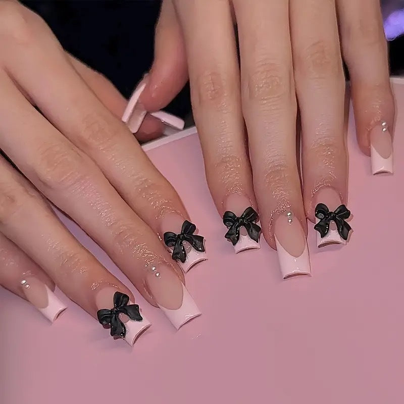 Stylish artificial nails with bow details Bowlift