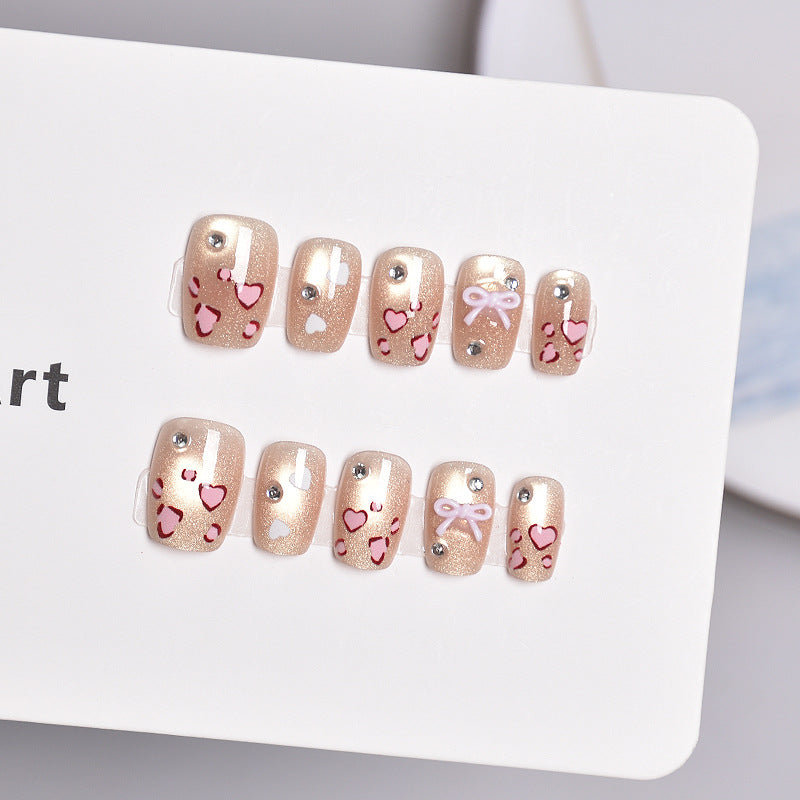 Artistic Press-On Nail Set with Heart and Bow Designs Bowlift