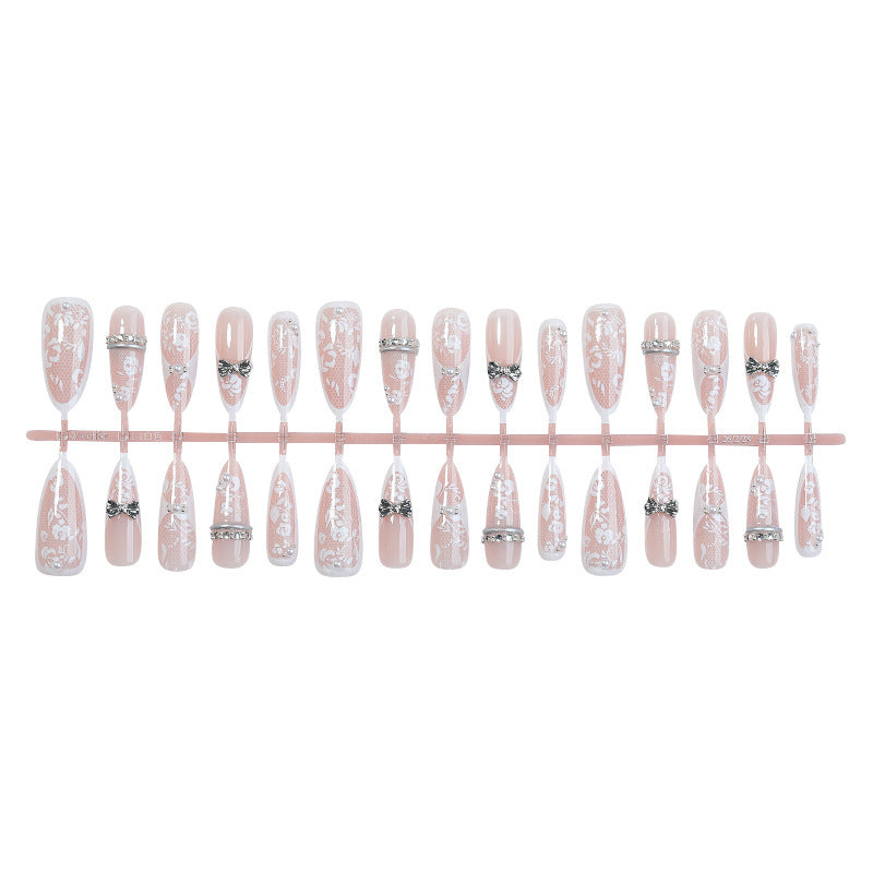 Artificial nail set with romantic floral design and sparkling accents Bowlift
