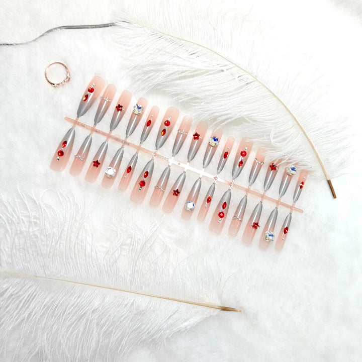 Artificial nails with glamorous glitter design and 3D applications Bowlift