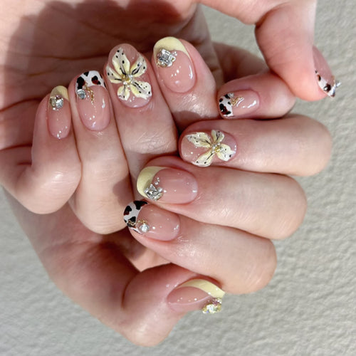 Exclusive nail art with floral design and glitter accents Bowlift
