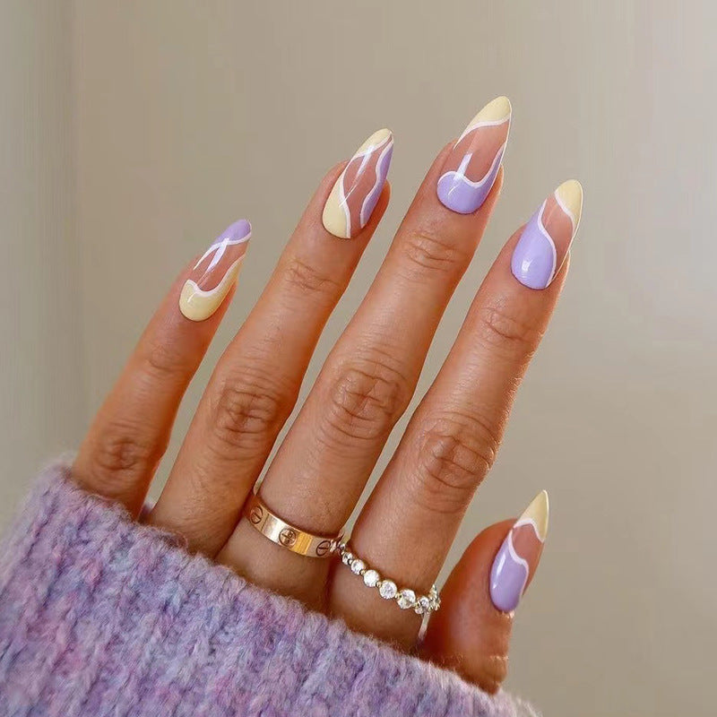 Artful Nail Extensions with Wave Design and Colorful Accents Bowlift