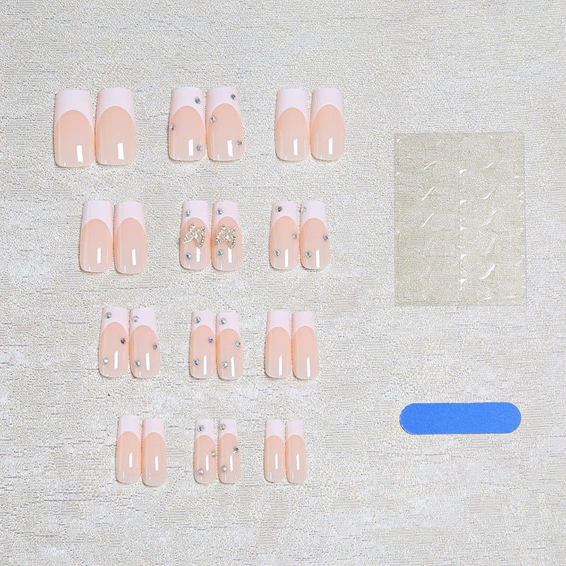 Acrylic nail set with glamorous 3D applications Bowlift