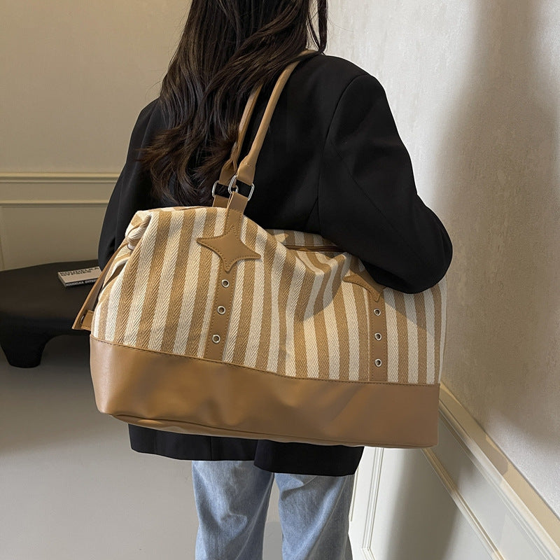 Elegant Sports Duffel Bag with Structured Outer Material and Sturdy Carry Straps Bowlift