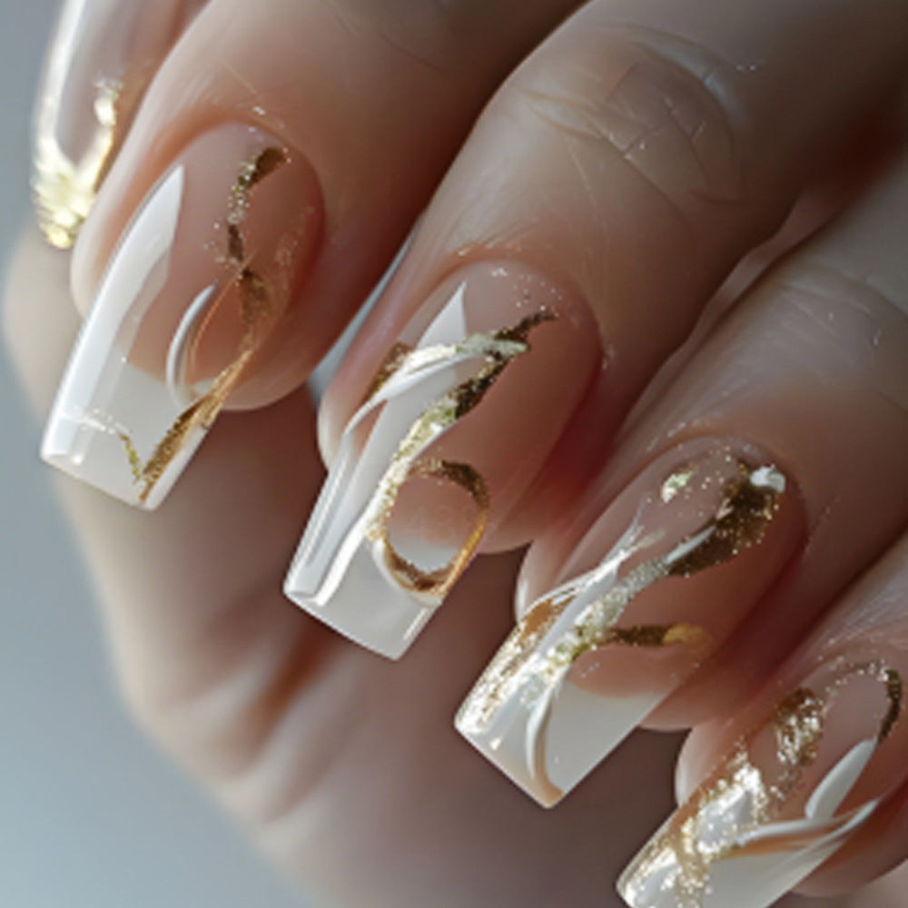 Artificial nails with elegant gold accents Bowlift