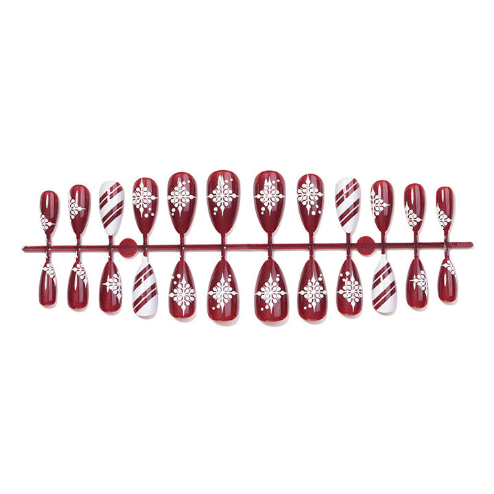 Acrylic Nail Set with Festive Winter Design and Glamorous Accents Bowlift