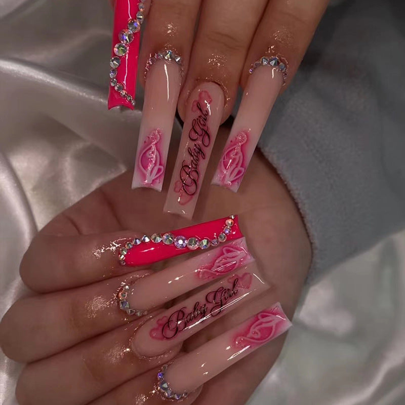 Artificial nail art with luxurious rhinestone and flower decorations Bowlift