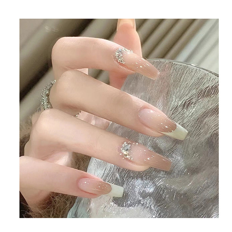 Artful stiletto nails with rhinestone accents Bowlift