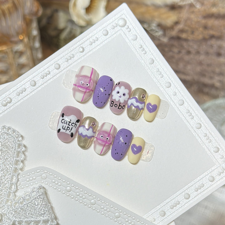 Playful Cartoon-Themed Press-On Nail Art Set Bowlift