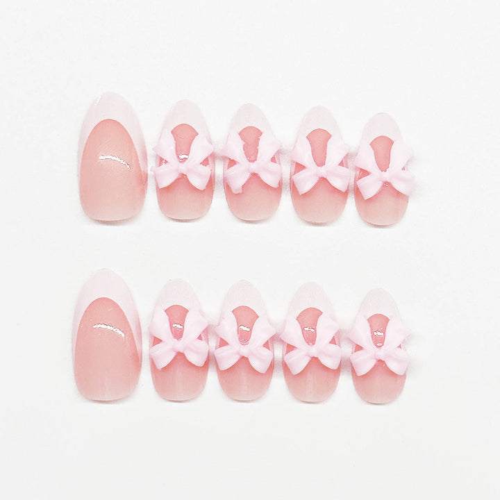 Nail art set with playful bow accents Bowlift