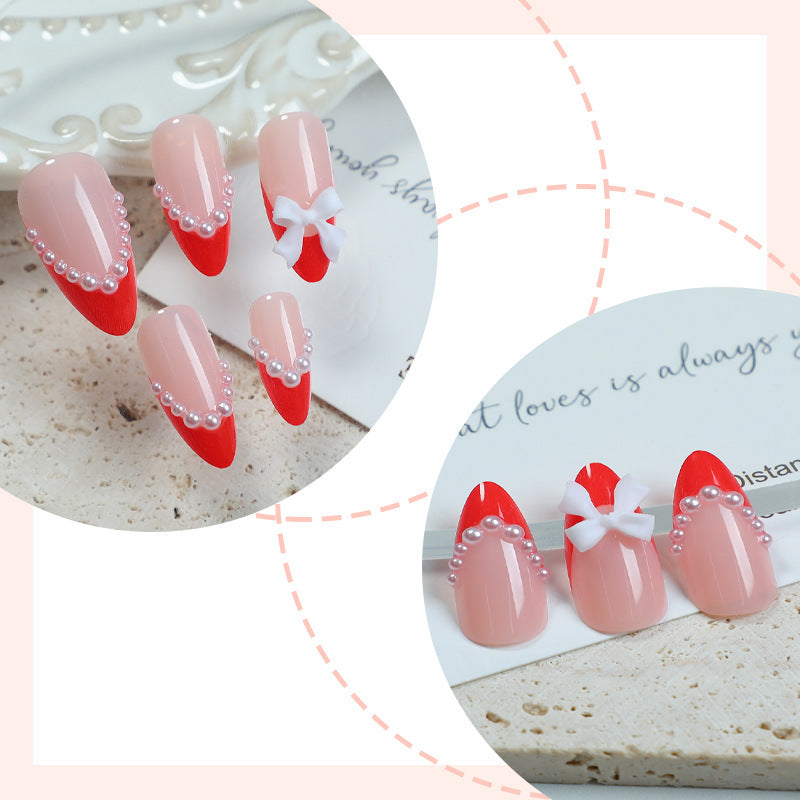 Elegant Press-On Nail Set with Pearl and Bow Accents Bowlift