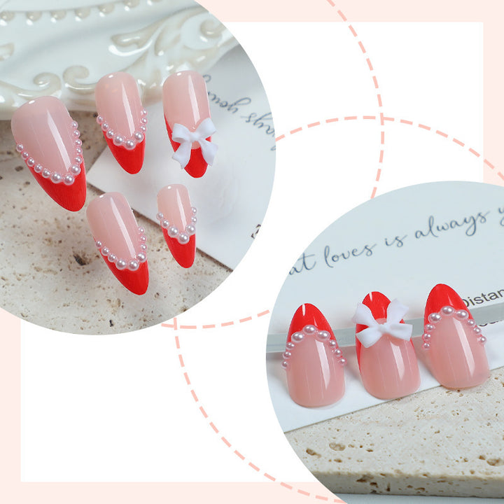 Elegant Press-On Nail Set with Pearl and Bow Accents Bowlift