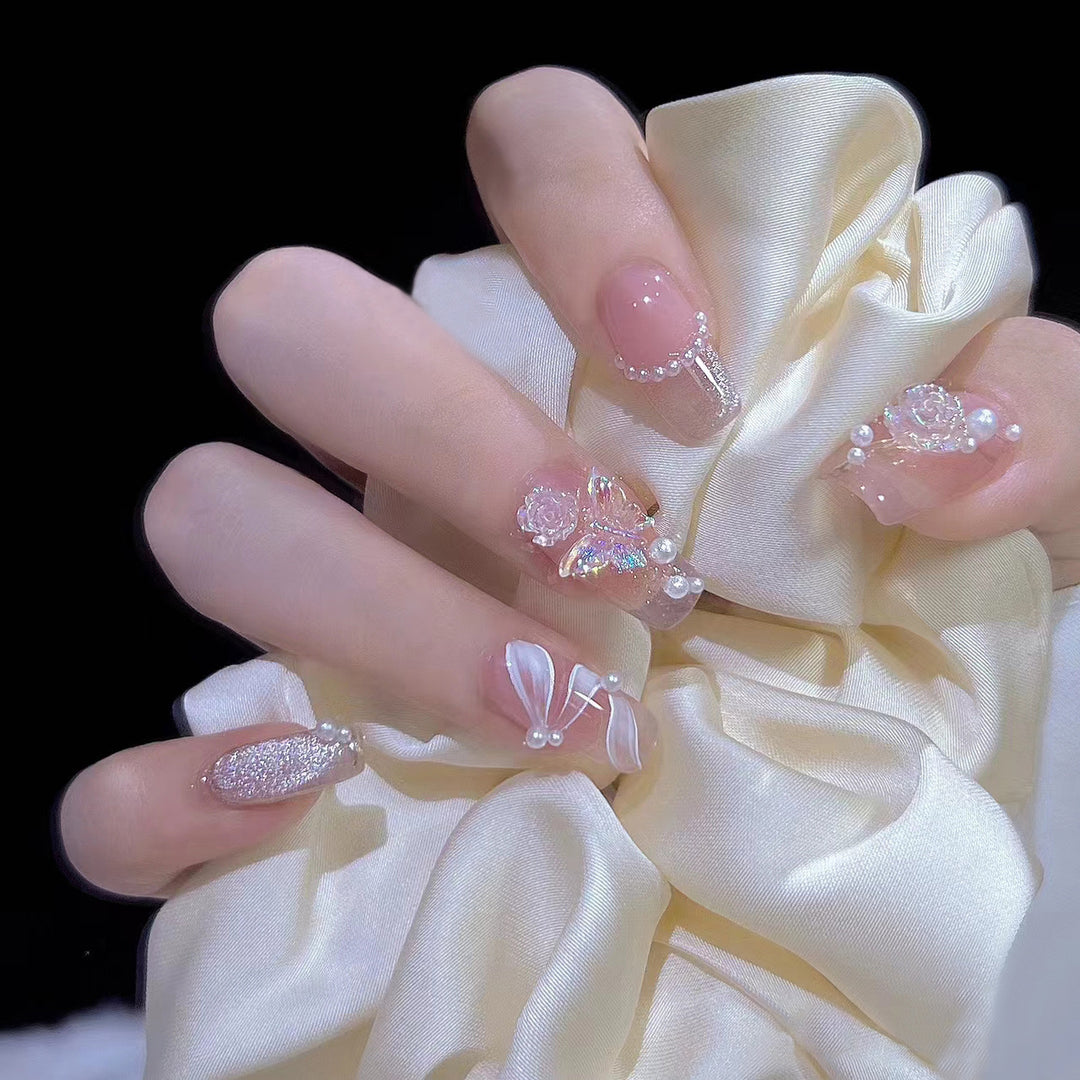 Glamorous artificial fingernails with glitter and moon designs Bowlift