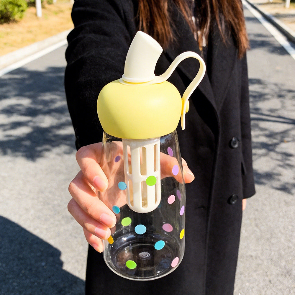 Women's water bottle with integrated fruit filter and practical carrying handle Bowlift