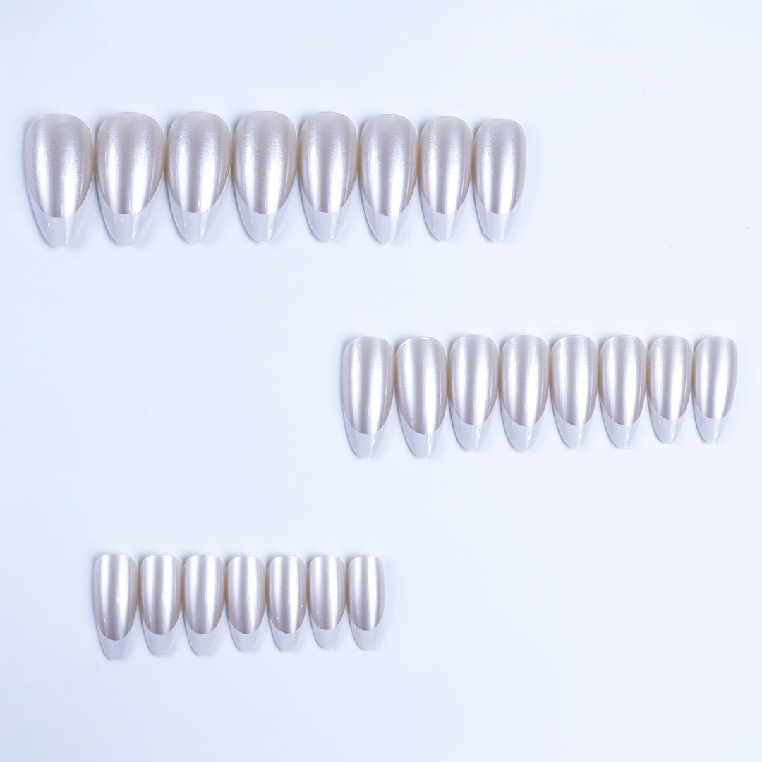 Artificial nails in elegant French tip design Bowlift