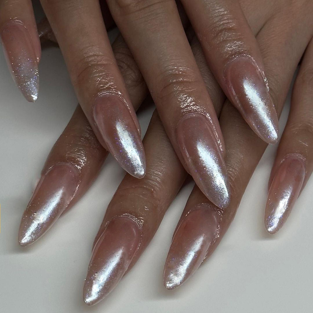 Artistic stiletto nails with glitter gradient and elegant design Bowlift