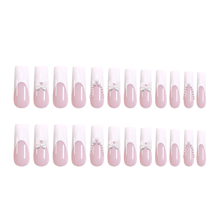 Artistic and elegant acrylic nails with pearl and flower decor Bowlift