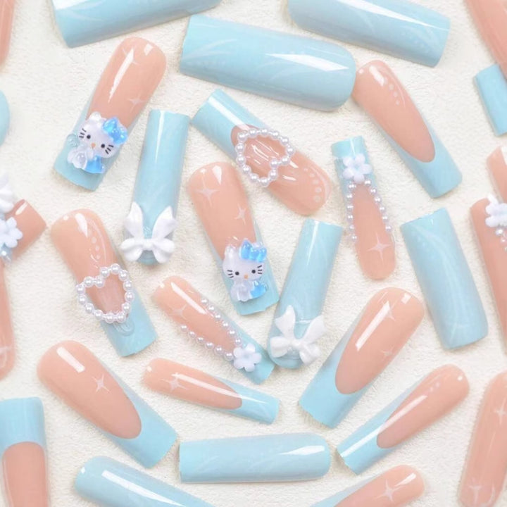 Artificial nail set with playful 3D accents Bowlift
